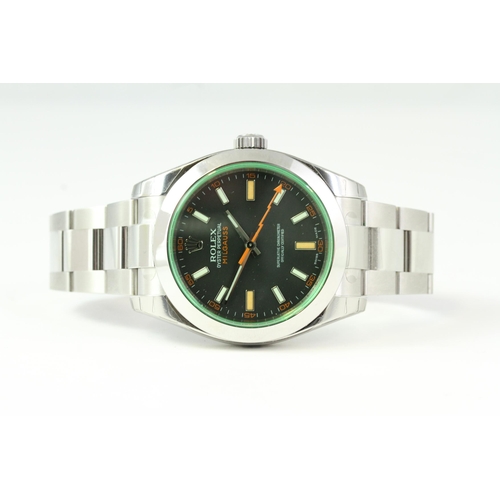 23 - UNWORN ROLEX MILGAUSS 116400GV BOX AND PAPERS, circular black dial with applied hour markers, orange... 