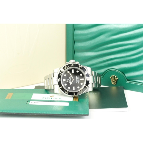 31 - ROLEX SUBMARINER 114060 BOX AND PAPERS 2018, circular gloss black dial with applied hour markers, Me... 
