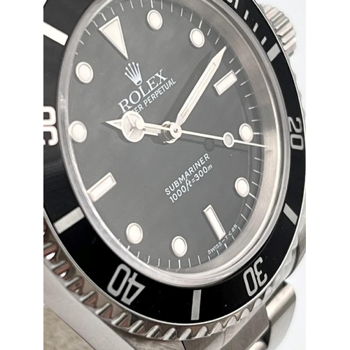 40 - ROLEX SUBMARINER NO DATE 14060 WITH BOX AND PAPERS 1998, Black dial with applied baton and dot hour ... 