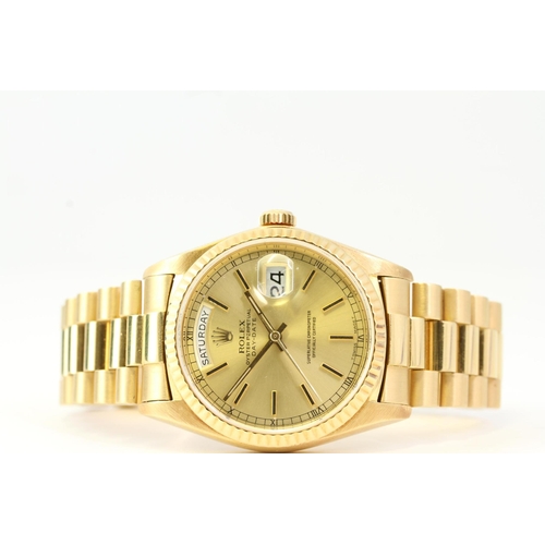 43 - 18CT ROLEX DAY DATE REFERENCE 18038 WITH BOX CIRCA 1978, circular gold dial with baton hour markers,... 