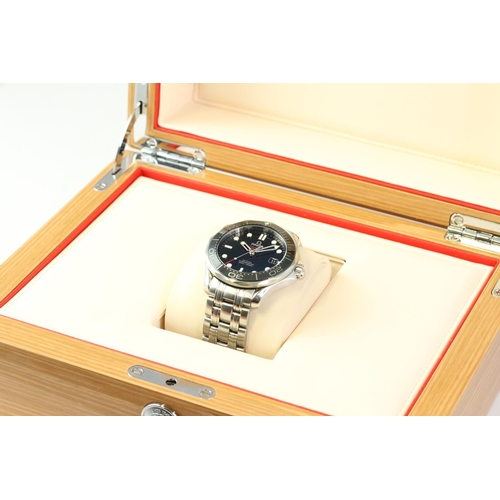 7 - OMEGA SEAMASTER 300 CO-AXIAL AUTOMATIC WITH BOX, circular gloss black dial with applied hour markers... 