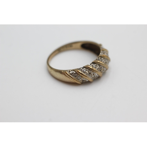 1060 - 9ct gold diamond fancy ring (2.5g)