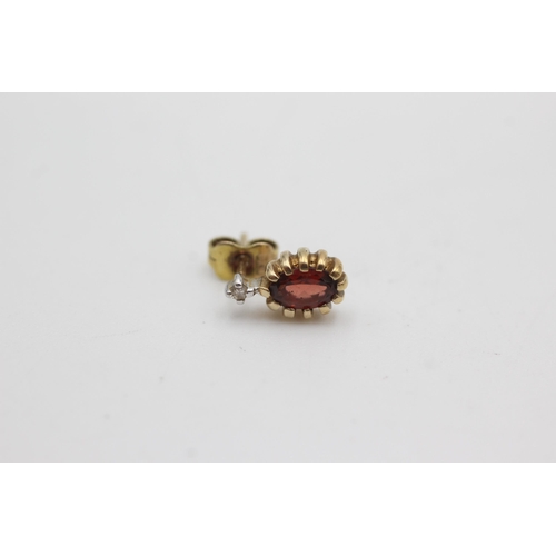 1066 - 9ct gold garnet & diamond stud earrings (1.8g)