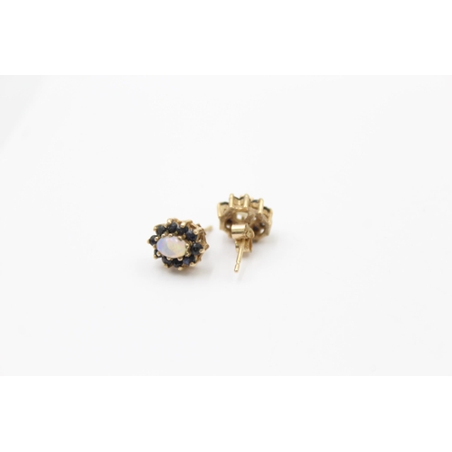 1073 - 2 x 9ct gold paired sapphire earrings inc. opal & diamond (2.7g)