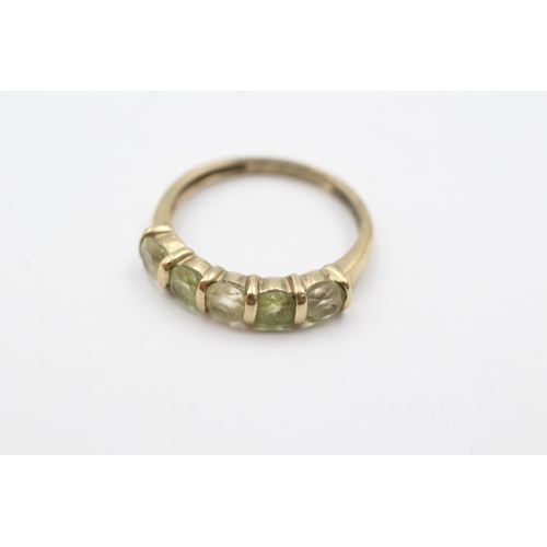 1097 - 9ct gold vintage green gemstone five stone dress ring (1.8g)