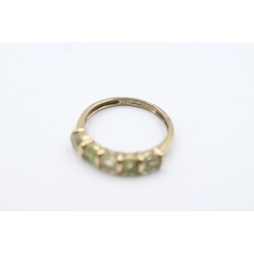 1097 - 9ct gold vintage green gemstone five stone dress ring (1.8g)