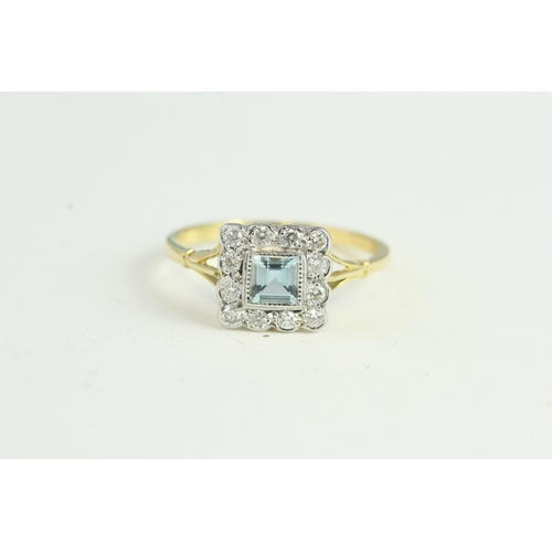 1529 - 18YG Square Aqua & Diamond Cluster Ring. Est A0.20ct & D0.25ct.