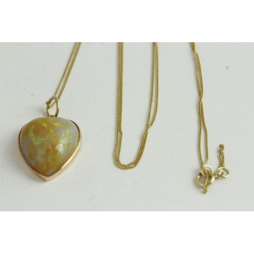 1108 - Victorian antique gold natural opal carved heart pendant necklace. Hung on a modern chain. The penda... 