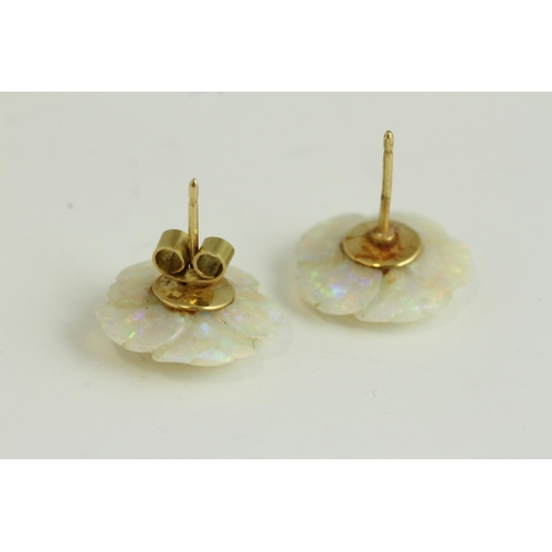 1109 - Fine 18ct gold carved natural opal and ruby flower earrings, set in 18ct gold. The earrings measure ... 