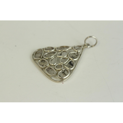 1110 - Fine silver and rose cut diamond pendant, set in silver . Measures 2cm x 2.2cm wide.