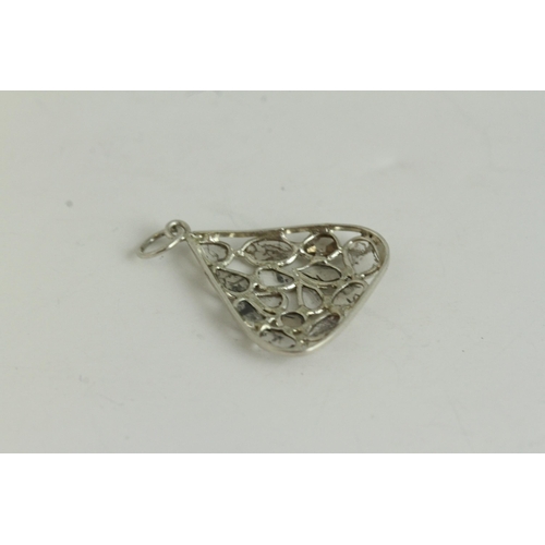 1110 - Fine silver and rose cut diamond pendant, set in silver . Measures 2cm x 2.2cm wide.