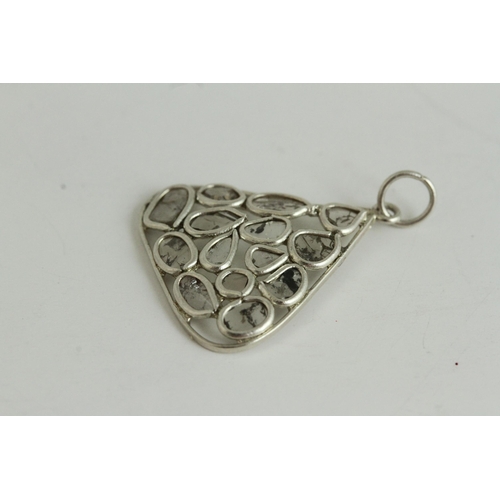 1110 - Fine silver and rose cut diamond pendant, set in silver . Measures 2cm x 2.2cm wide.