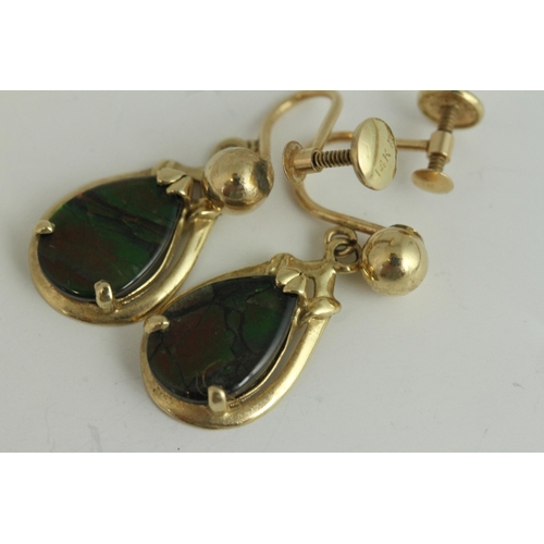 1111 - Fine 14ct gold and opal turn screw drop earrings. Marked 14k . Measures 2.5cm x 1.2cm wide. Weighs 3... 