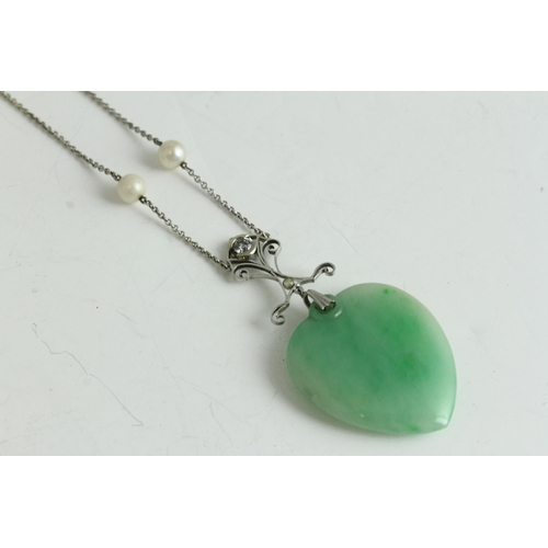 1132 - Art Deco white gold diamond and jade heart pendant necklace. Set in white gold with two cultured pea... 