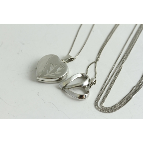 1133 - Fine 9ct gold pair of heart locket and pendant necklaces. Set in 9ct white gold . The total combined... 