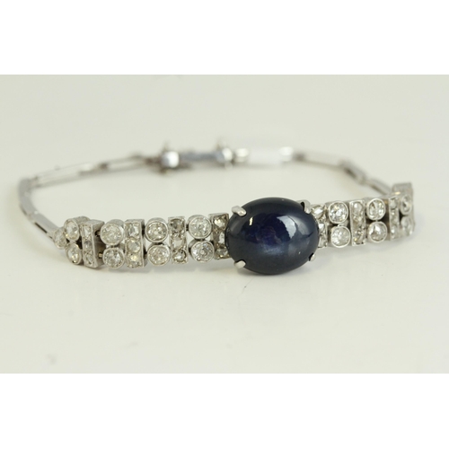 1508 - Antique Art Deco 18ct white gold sapphire and diamond bracelet. Set with a large 10.3 carat cabochon... 