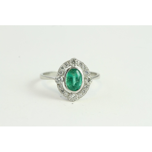 1521 - Platinum Oval Bezel-set Emerald Inside Open Halo of Diamonds with 4 Focal Points Slightly Raised. No... 