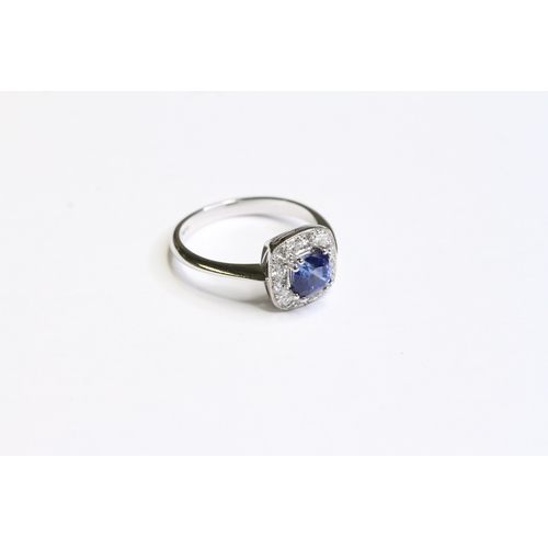 1538 - 18CT WHITE GOLD SAPPHIRE AND DIAMOND CLUSTER RING, sapphire weight 1.16ct. UK size M. Total weight 3... 