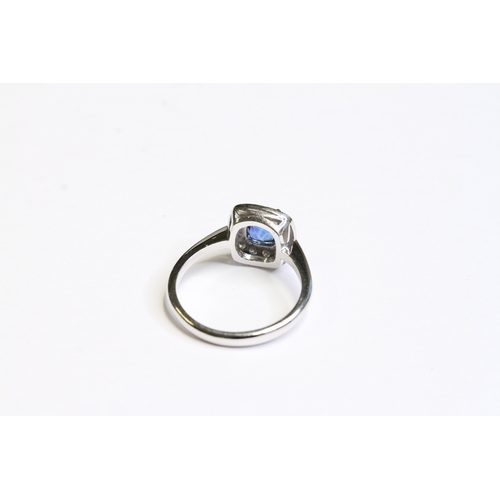 1538 - 18CT WHITE GOLD SAPPHIRE AND DIAMOND CLUSTER RING, sapphire weight 1.16ct. UK size M. Total weight 3... 