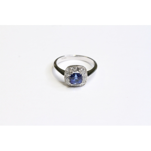 1538 - 18CT WHITE GOLD SAPPHIRE AND DIAMOND CLUSTER RING, sapphire weight 1.16ct. UK size M. Total weight 3... 