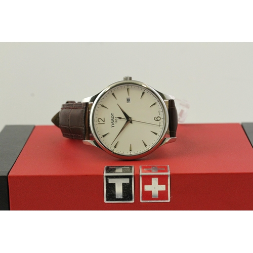 131 - TISSOT QUARTZ WRISTWATCH WITH BOX AND PAPERS, circular white dial with baton and arabic numeral hour... 