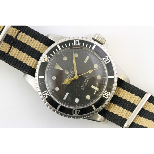 23 - ROLEX SUBMARINER 5513 POINTED CROWN GUARDS CIRCA 1963, circular black dial with dot hour markers, gi... 