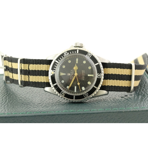 23 - ROLEX SUBMARINER 5513 POINTED CROWN GUARDS CIRCA 1963, circular black dial with dot hour markers, gi... 