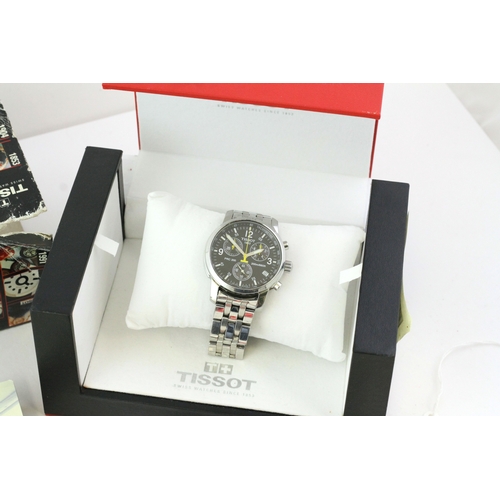 134 - TISSOT PRC200 CHRONOGRAPH REFERENCE  T. 461 WITH BOX AND PAPERS, black dial, yellow hands, stainless... 