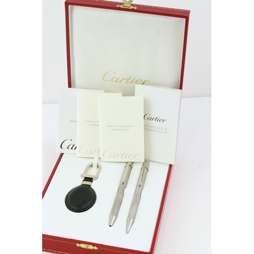 290 - CARTIER PEN AND KEYRING SET, Must De Cartier Pen & Pencil, brushed steel cases, leather key ring, wi... 