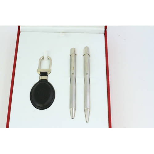 290 - CARTIER PEN AND KEYRING SET, Must De Cartier Pen & Pencil, brushed steel cases, leather key ring, wi... 