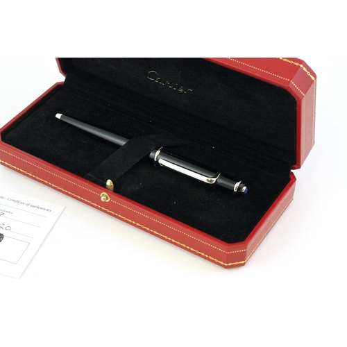 297 - DIABOLO DE CARTIER BALL POINT PEN WITH BOX AND PAPERS, black case, cabochon top, with box and authen... 