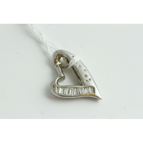 1027 - Fine 18ct gold and heavy diamond heart pendant . Set in heavy white gold with diamonds. Weighs 10.4 ... 