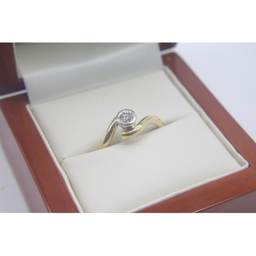 1005 - Fine 18ct gold and 15 point diamond solitaire ring. Set in 18ct gold hallmarked with a estimated 15p... 