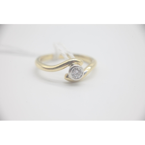 1005 - Fine 18ct gold and 15 point diamond solitaire ring. Set in 18ct gold hallmarked with a estimated 15p... 