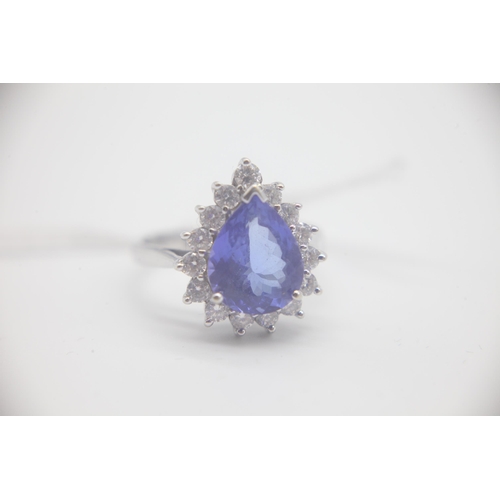 1016 - Fine 14ct Gold Pear Shaped Tanzanite and 60pt Diamond Ring
Set with a very large pearl shaped Tanzan... 