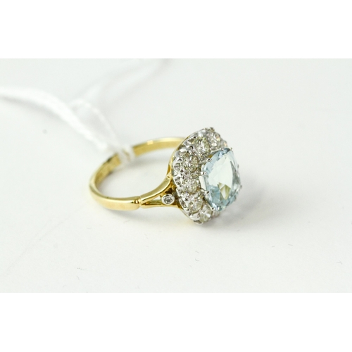 1018 - Fine 18ct gold platinum and diamond aquamarine cluster ring. The head of the ring measures 1.5cm in ... 