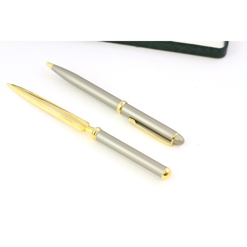 1024 - BOSTON PEN AND LETTER OPENER SET, brushed steel case and handle, gold plated detail and blade,