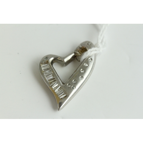 1027 - Fine 18ct gold and heavy diamond heart pendant . Set in heavy white gold with diamonds. Weighs 10.4 ... 