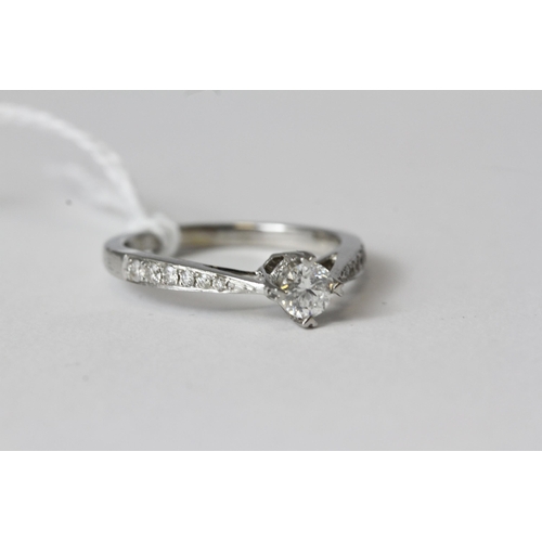 1031 - Fine 9ct White Gold 50pt Diamond Solitaire RingMarked 0.50 for 50pts as well as a full 9ct Gold Lond... 