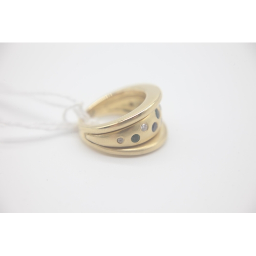 1034 - Fine 18ct Gold Sapphire Diamond and Emerald RingSet in 18ct Gold with an unusual sun and moon design... 