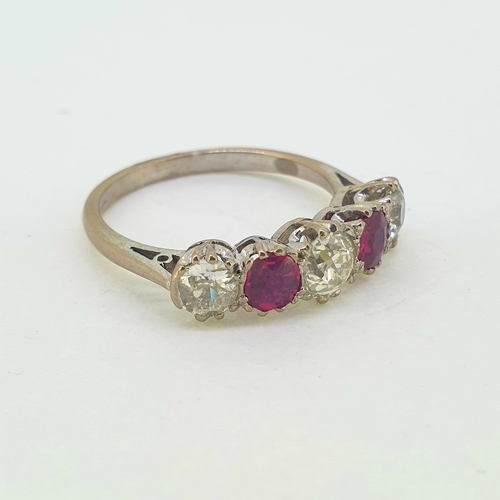 1236 - 18WG ruby and diamond 5 stone ring (Tests 18)
natural ruby (Thai)