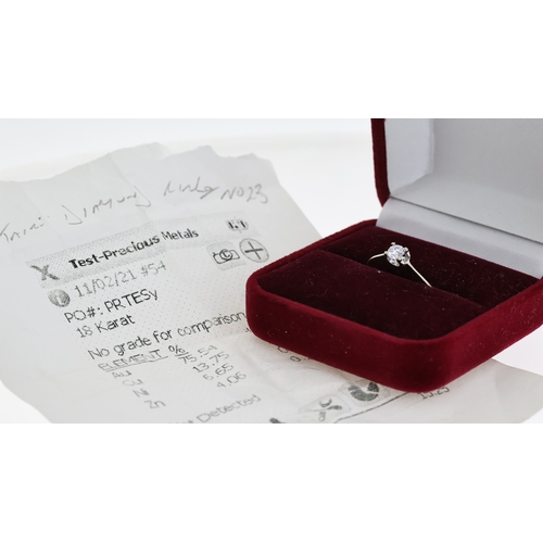 1284 - Fine 18ct white gold and 25 point estimated diamond solitaire ring. The diamond is a VVS1 stone with... 