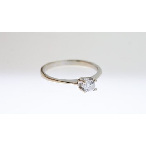 1284 - Fine 18ct white gold and 25 point estimated diamond solitaire ring. The diamond is a VVS1 stone with... 