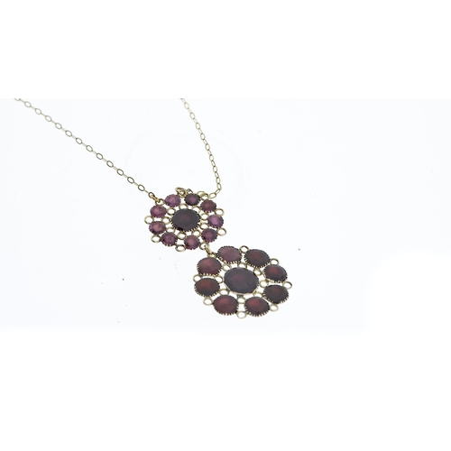 1289 - Antique georgian flat cut garnet necklace. Domed back. The pendant measures 2.2cm wide.