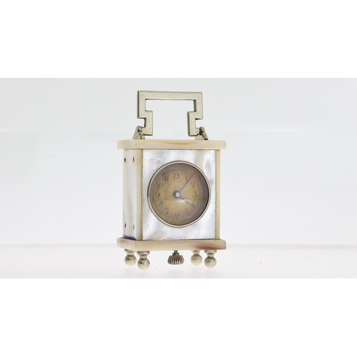 183 - PERIOD MINIATURE CARRIAGE CLOCK, MOTHER OF PEARL WITH LEATHER CASE, 36x30mm case with chrome feet an... 