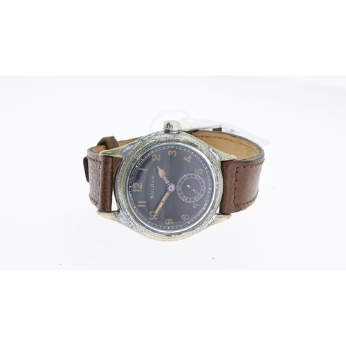 196 - VINTAGE BULOVA U.S MILITARY WRISTWATCH, circular black dial with patina arabic numeral hour markers,... 