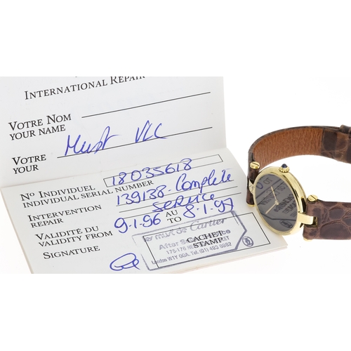 2 - *TO BE SOLD WITHOUT RESERVE* MUST DE CARTIER WITH CARTIER SERVICE DOCUMENT, circular dark brown 'spi... 