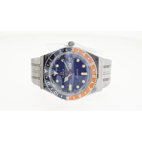 201 - *TO BE SOLD WITHOUT RESERVE* UNWORN Q TIMEX GMT 'PEPSI' WITH BOX, circular blue dial with cream hour... 