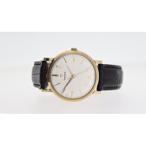 242 - GOLD OMEGA MANUAL WIND WRISTWATCH CIRCA 1950's, circular silver dial with baton hour markers, 34mm g... 