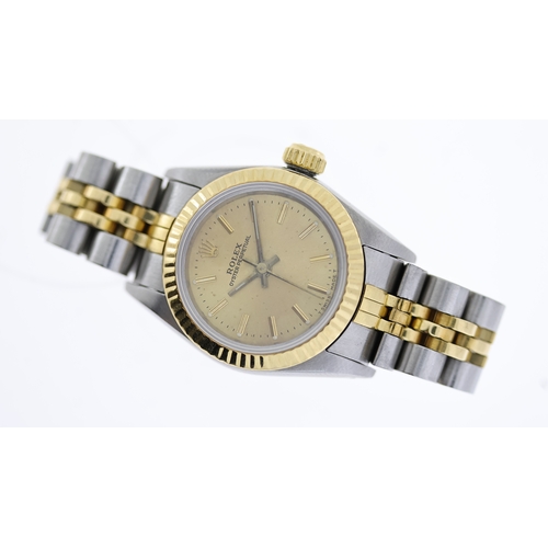 51 - LADIES ROLEX OYSTER PERPETUAL 67193 CIRCA 1988, circular champagne dial with baton hour markers, gol... 